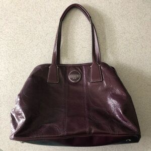 Coach plum colored vintage bag with inside clasp pocket